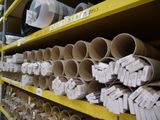 many rolls of toilet paper on the shelves in the store