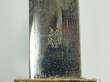 a close up of a knife on a table