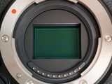 a close up view of a digital camera with a green screen
