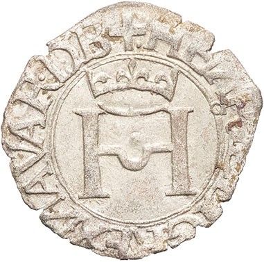 a silver coin with a crown on top of it