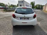 a white car parked on the side of the road