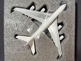 a picture of a model of a plane on a piece of paper