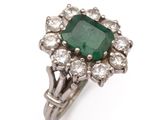 an emerald and diamond clusterer ring