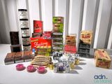 many boxes of food that are sitting on a table