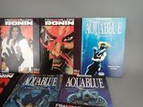 a lot of comic books that are on the table