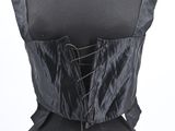 a close up of a mannequin torso with a black dress on it