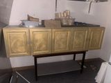 a kitchen with a sink and a counter in it
