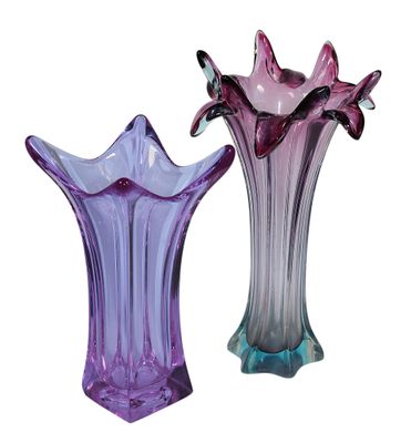 purple and blue glass vases on a white background with a white background