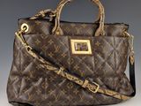 Sac à main Louis Vuitton en cuir marron à motif Monogram, avec finitions dorées