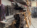 a large pile of wood sitting in a warehouse