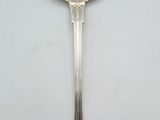 a silver spoon with a spoon handle on it