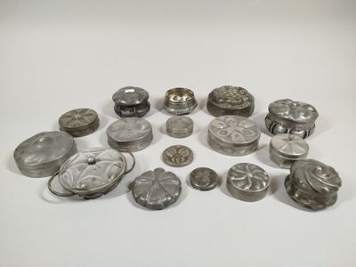 several different types of buttons are arranged on a white surface