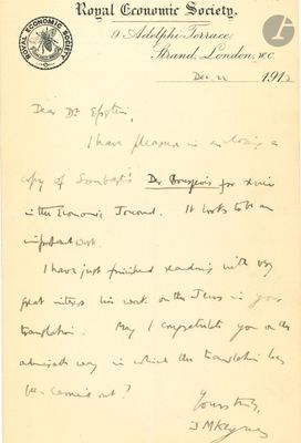 une vieille lettre manuscrite écrite par un homme tenant un stylo