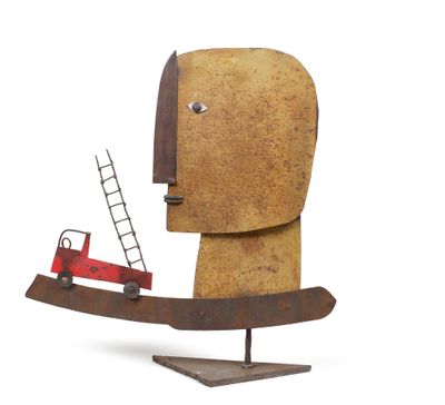 une sculpture représentant un homme avec une échelle sur laquelle se trouve un camion