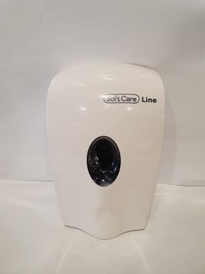 un distributeur de papier essuie-tout blanc posé sur un comptoir