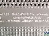 a close up of a metal plate with a label on it