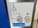 a close up of a button on the side of a machine