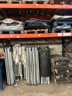 a lot of items on the shelves in the warehouse