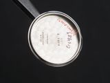 a close up of a metal pan with a lid