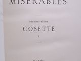 an old book with a black and white title on it