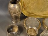 a lot of silver items that are on a table