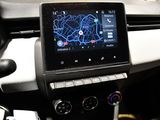 the dashboard of a car with a gps device in the center