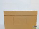 a brown box with a cross on it sitting on a table