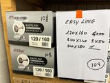 trois boîtes d'« Easy Links » sur une étagère dans un magasin
