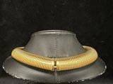 an image of a hat with a gold chain on it