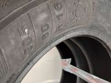 a close up of a tire with a tire wren on it