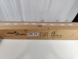 a box with a sticker on it sitting on top of a table