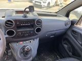 a dashboard of a small car with a steering control
