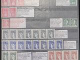 an old picture of a collection of stamps on display in a box