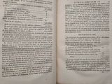 someone is holding a book open to a page with a picture on it