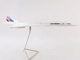 a model of a plane on a stand on a white background