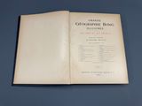 an open book on a table with a blue background