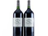 two bottles of wine that are sitting next to each other