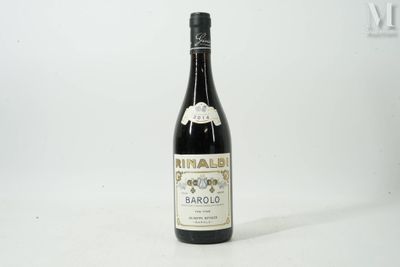 a bottle of wine that is sitting on a table