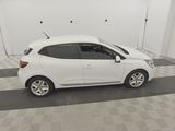 the white car is parked in the garage of the building