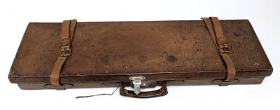 an old suitcase that is sitting on a white surface