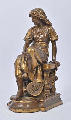 bronze statue of a woman sitting on a stool with a guitar