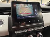 a picture of a car dashboard with a camera mounted on it