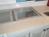 two sinks that are on the counter in the kitchen