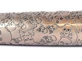 a close up of a metal object with a pattern on it