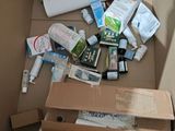 a cardboard box with a lot of items inside of it