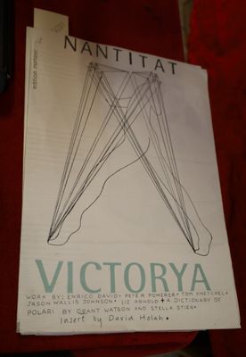 a picture of a book on a red chair