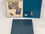 two books are sitting on a white surface one is blue and the other is red