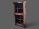 une photo d'une bibliothèque en bois avec une porte vitrée