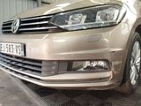 a car that is being worked on in the garage