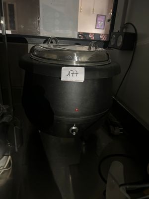 an image of a kitchen with a sink and a mirror